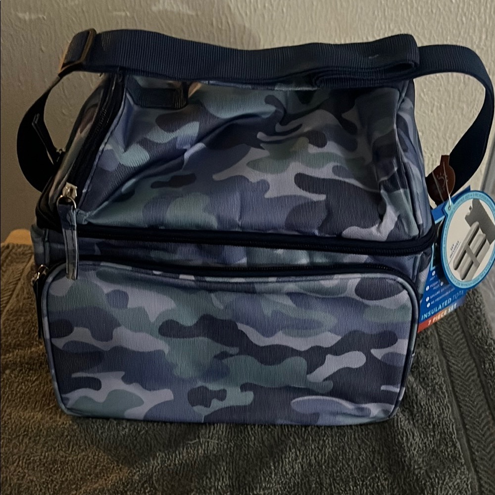 Gray and Blue Duffel Bag with Structured Design